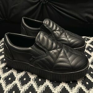 Strange cult spiderweb creeper slip ons